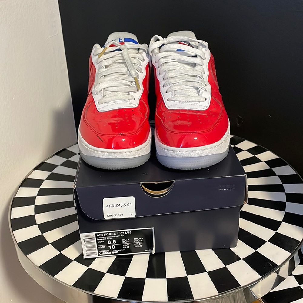 Air Force 1’s university red. Bubble gum bottoms in light blue.